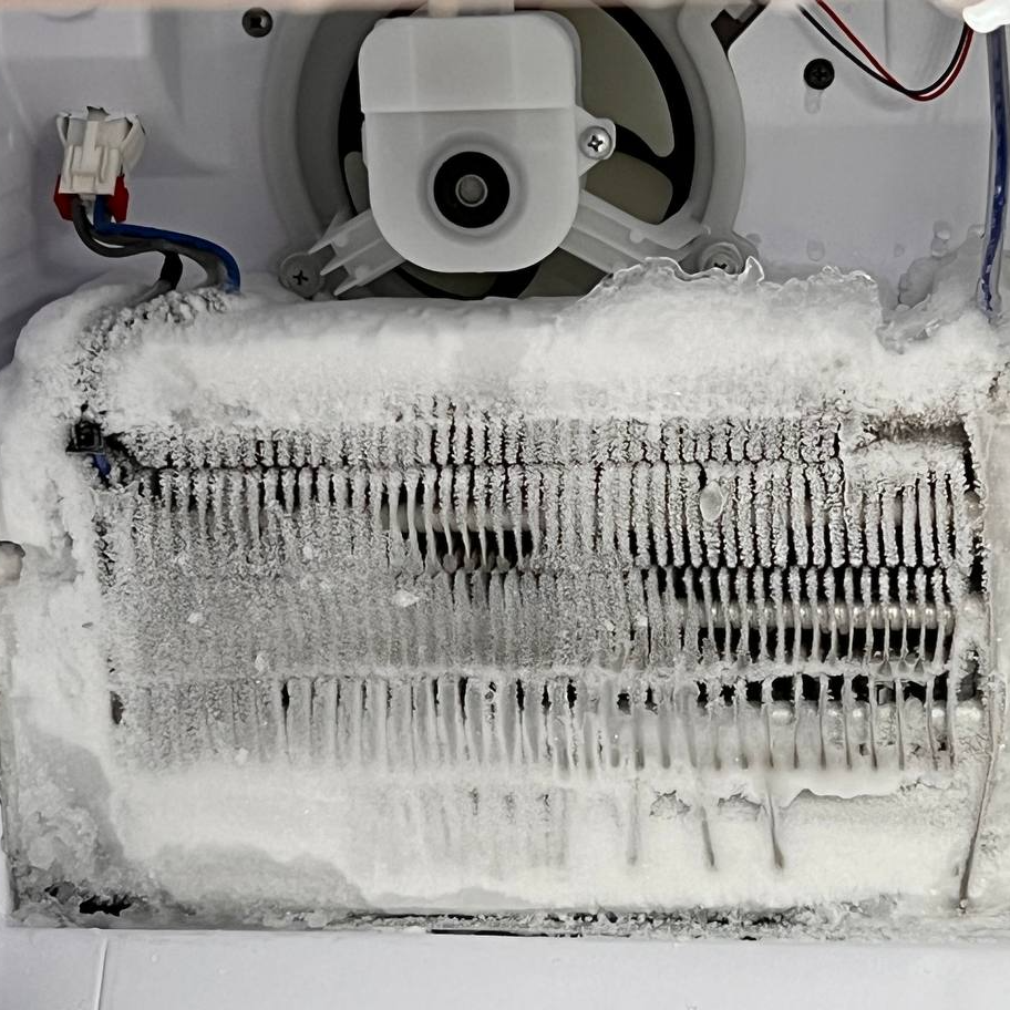 Frozen refrigerator evaporator during a repair in Fort Myers
